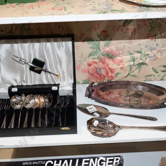 cased cutlery, plated tray, salad servers