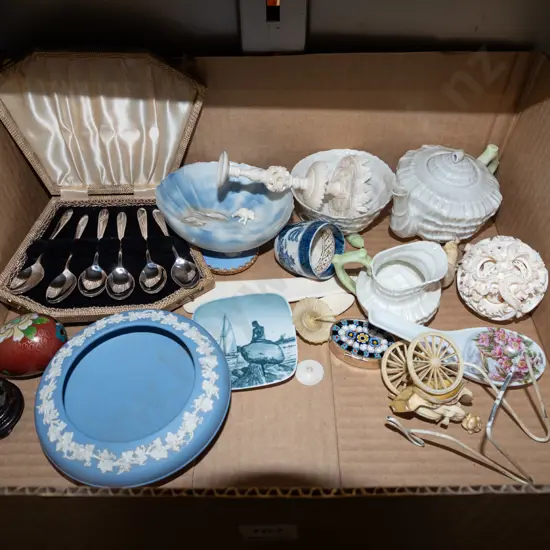 box; Belleek tea cup, creamer sugar, mystery ball etc