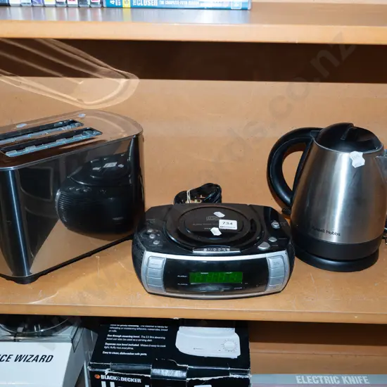 toaster, small electric kettle, CD radio bedside clock
