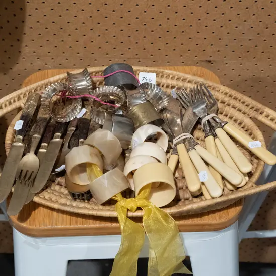 woven cane tray; napkin rings,forks, knives etc