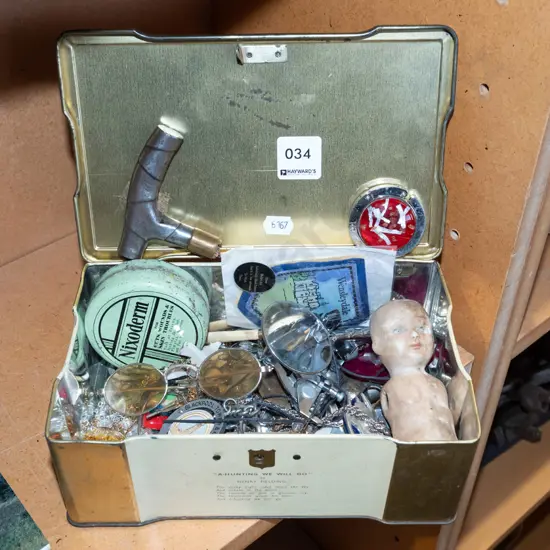vintage tin and contents; button holer, riding crop handle, badges etc