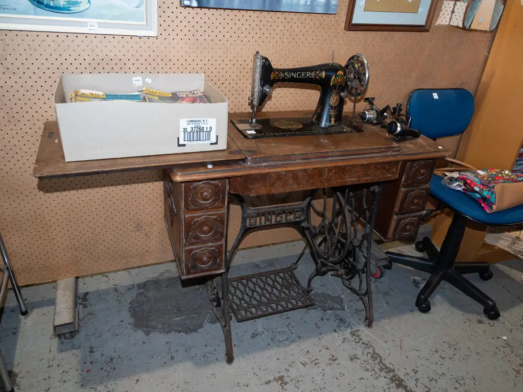 restorer's Singer treadle sewing machine with original belt - signs of age and wear Image 1++