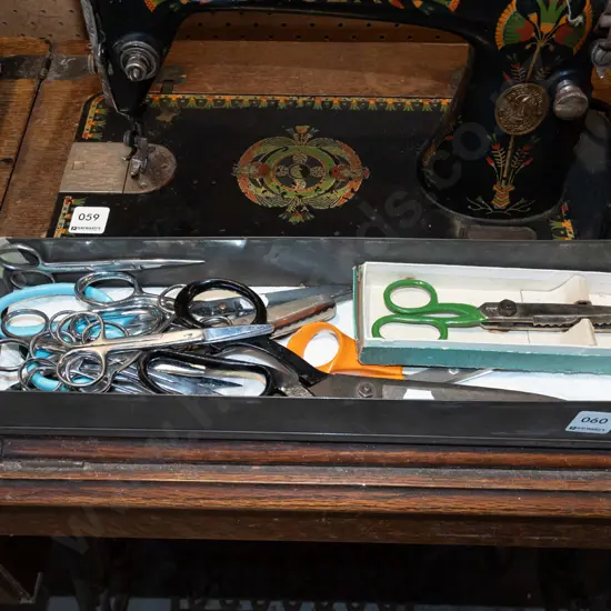 tin of scissors