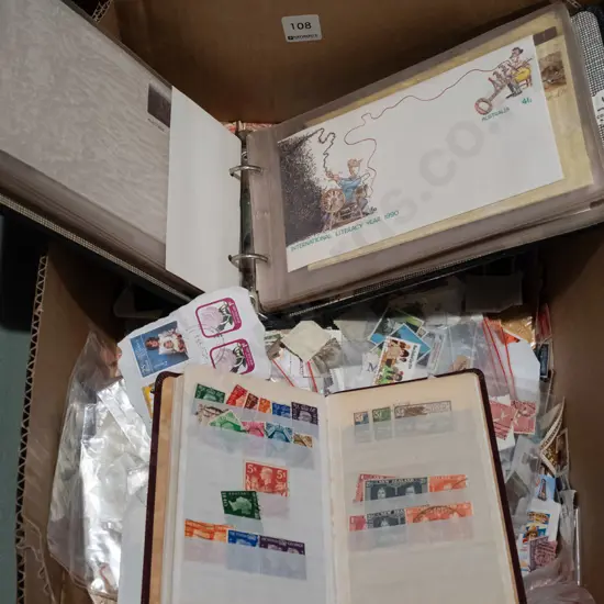 box of stamps, album of first day covers