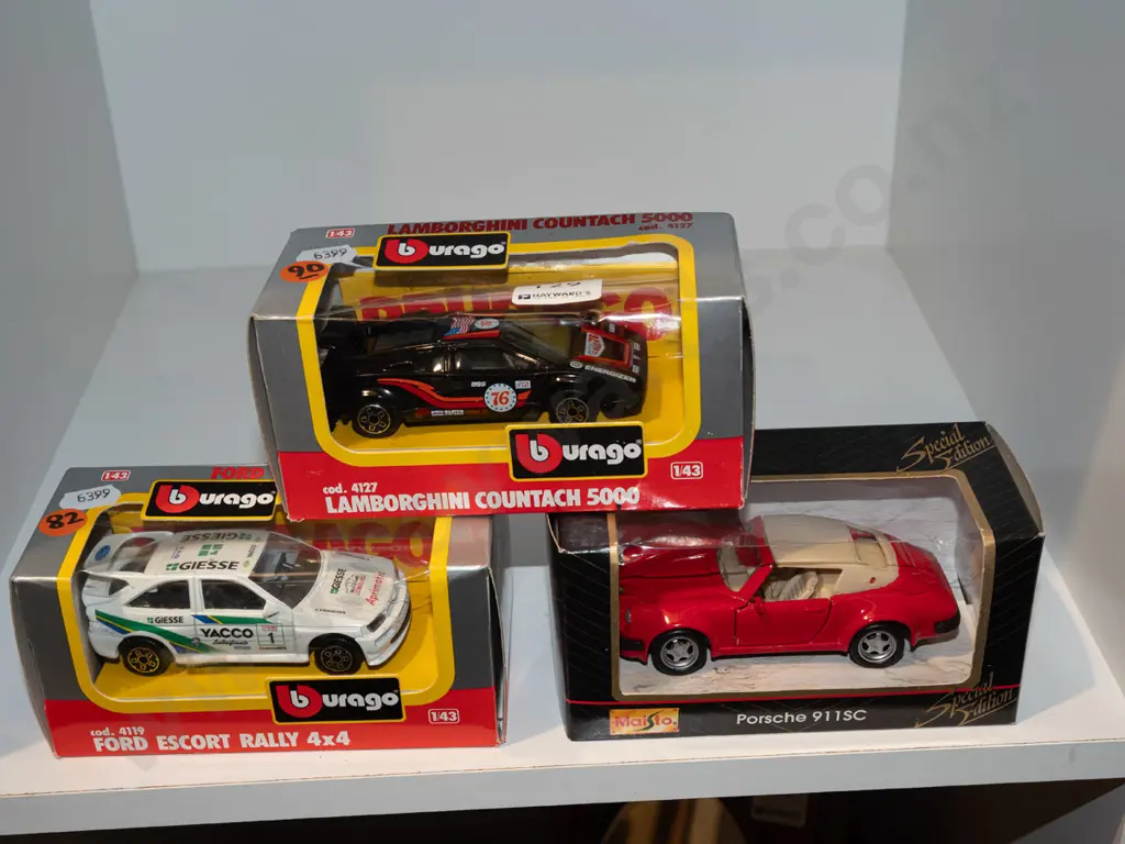 3x Burago boxed model vehicles Image 1++