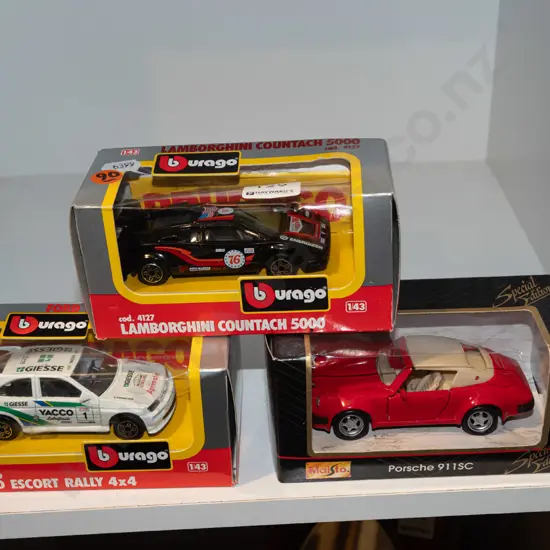 3x Burago boxed model vehicles
