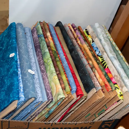 box of fabric pieces