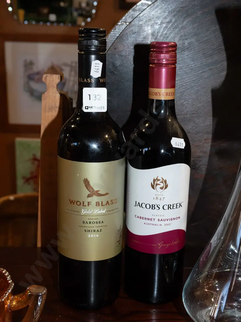 bottle of Wolf Blass shiraz 2016, Jacobs Creek cabernet sauvignon 2021 Image 1++