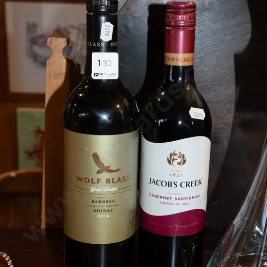 bottle of Wolf Blass shiraz 2016, Jacobs Creek cabernet sauvignon 2021