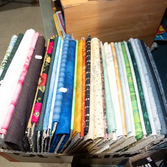 box of fabric pieces