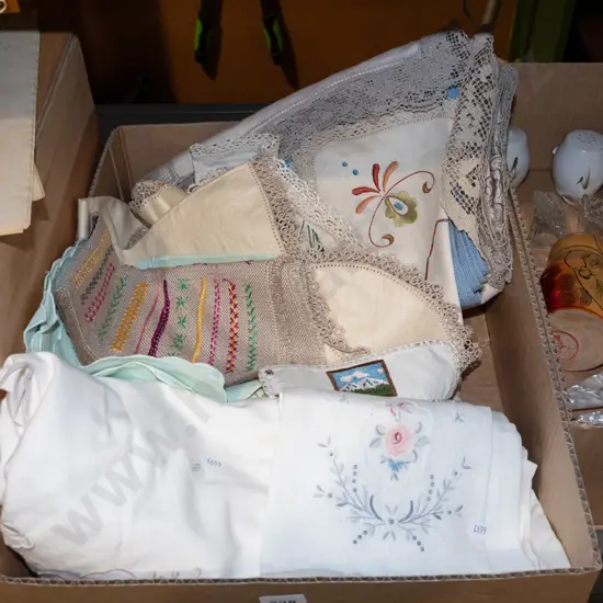 box; handworked linen, table cloths, napkins etc