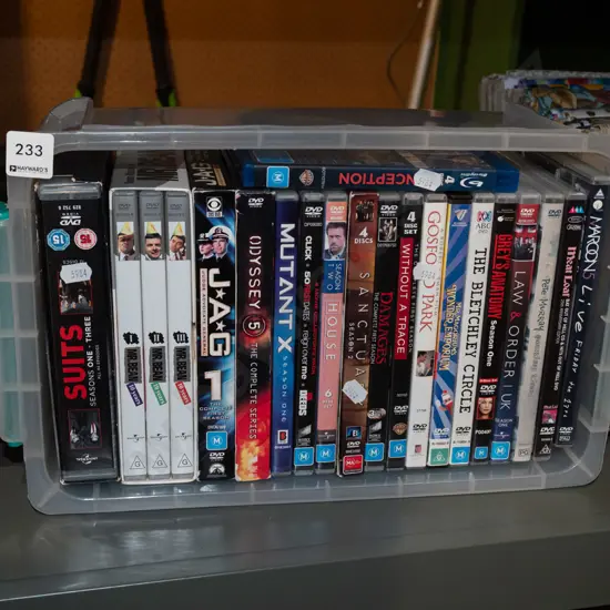 plastic tub of DVDs