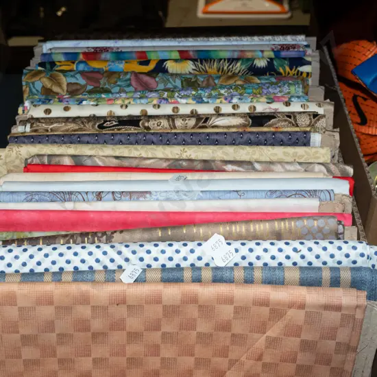 box of fabric pieces