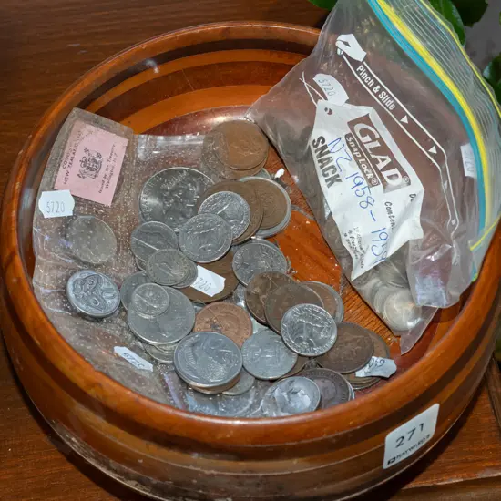 turned wooden bowl and coins - bowl has water damage