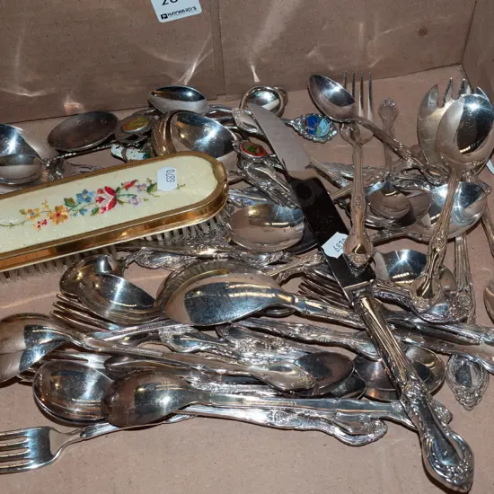 box of cutlery, clothes brush