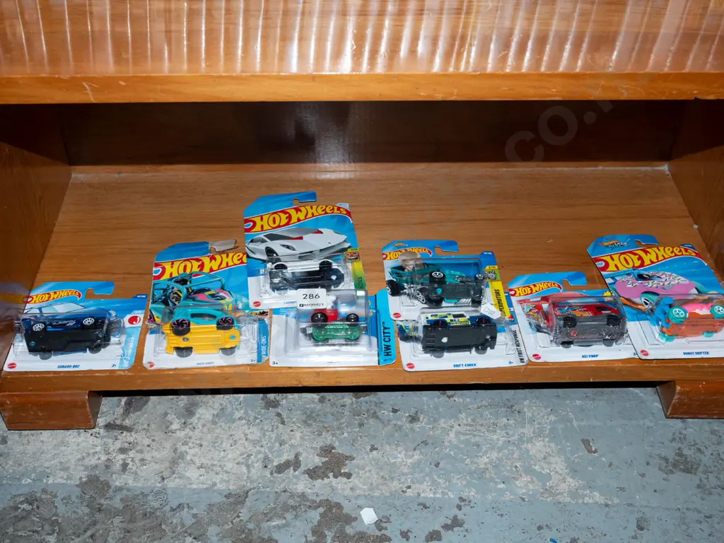 8x as new carded Hotwheels vehicles Image 1++