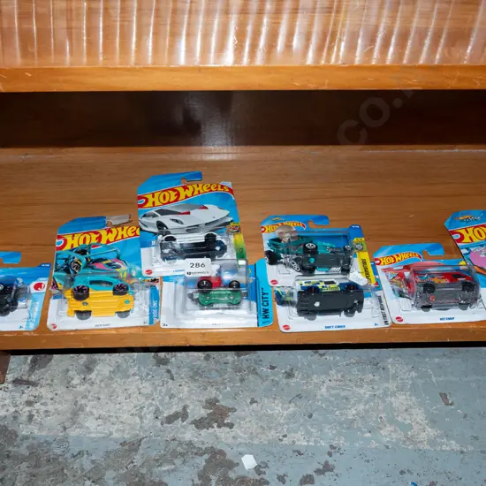8x as new carded Hotwheels vehicles