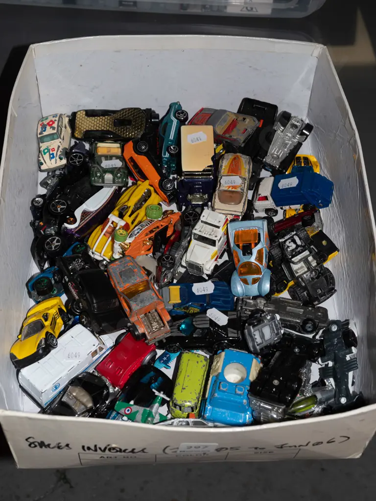 tray of plastic vehicles Image 1++