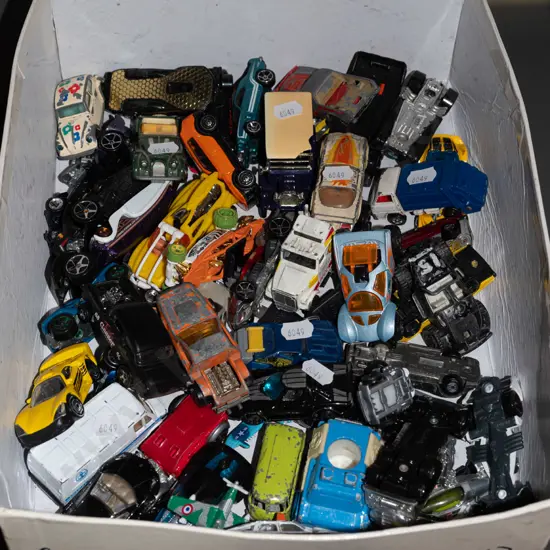 tray of plastic vehicles