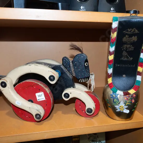 child's pull along wooden toy, cow bell