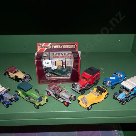 shelf of model vehicles