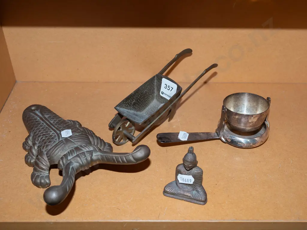 shelf; boot scraper, buddha ornament, small brass ornament, plated revolving tea strainer Image 1++