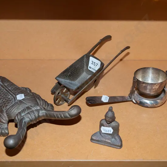 shelf; boot scraper, buddha ornament, small brass ornament, plated revolving tea strainer