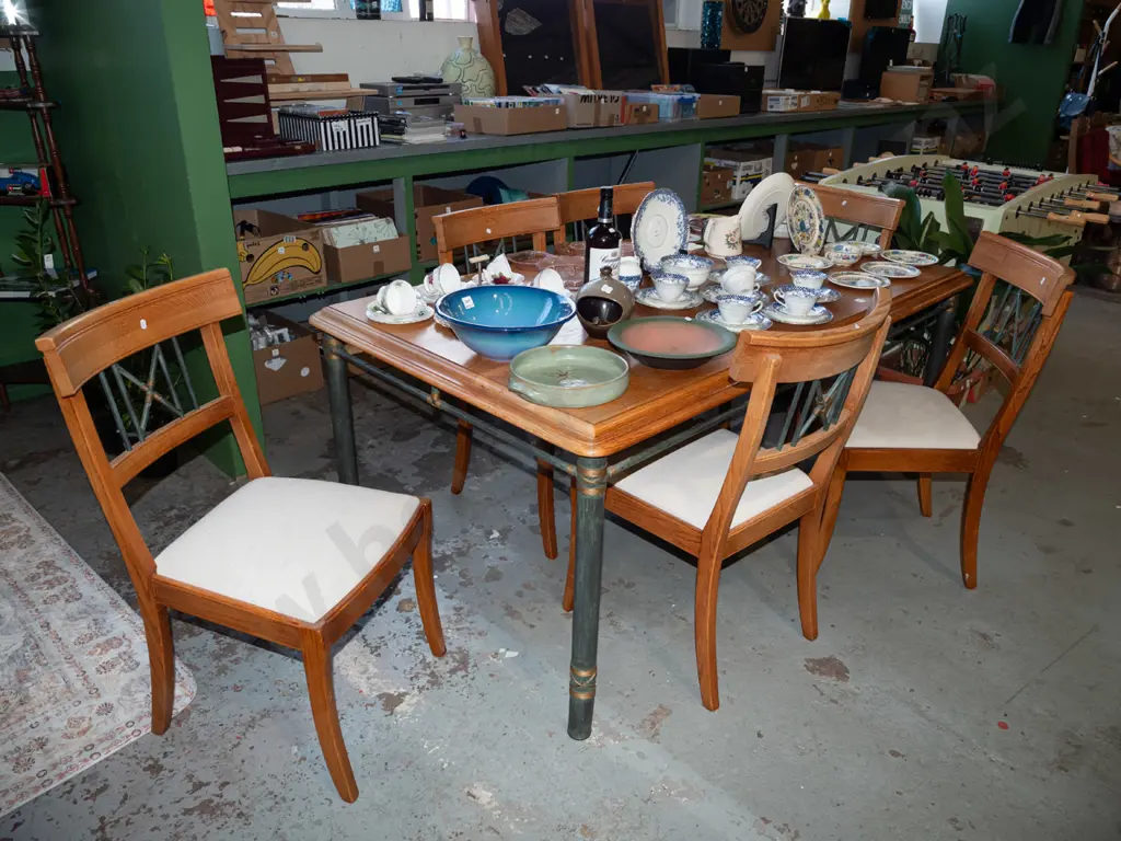 solid oak dining table on green  metal base with 6 metal backed and upholstered chairs Image 1++
