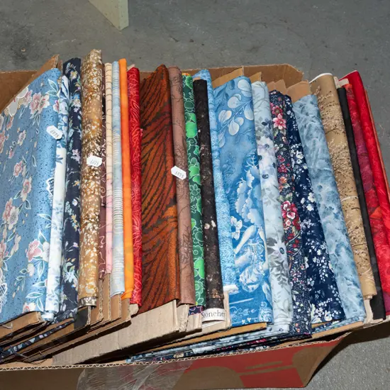 box of fabric pieces
