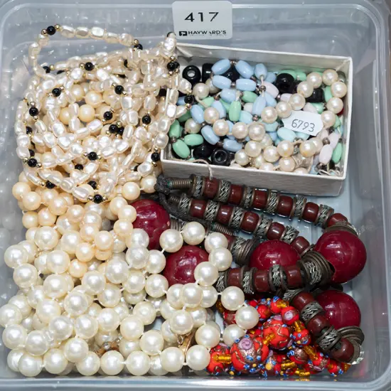 small tub of costume jewellery