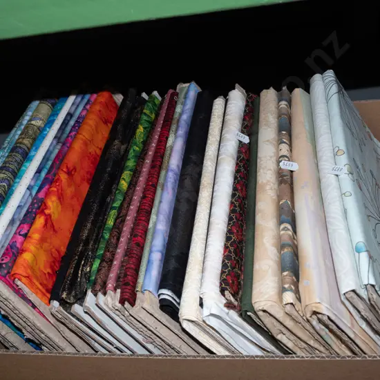 box of fabric pieces