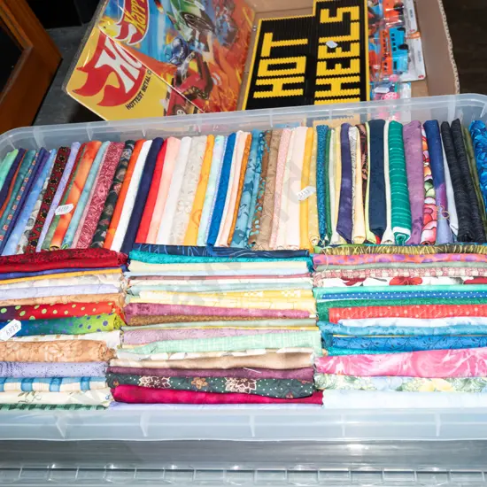 box of fabric pieces