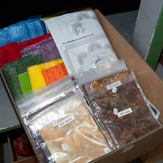 box; fabric pieces