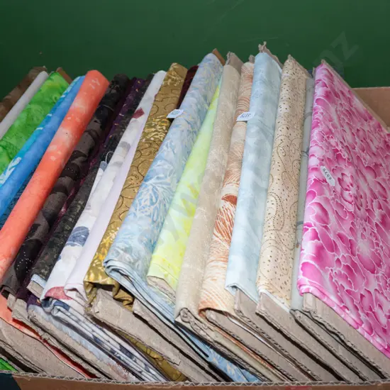 box of fabric pieces