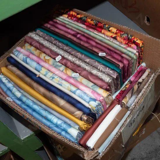 box of fabric pieces
