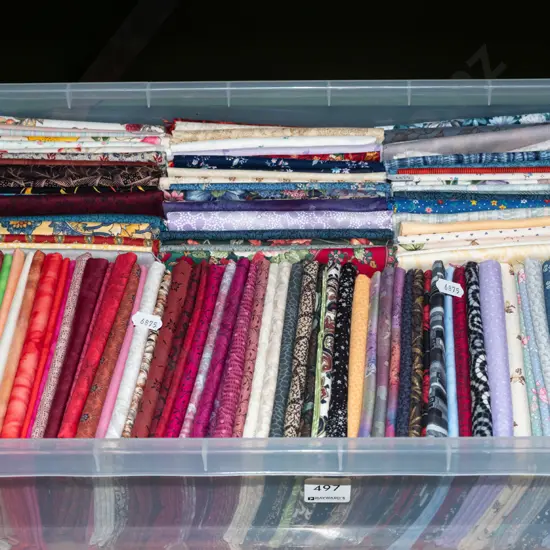 plastic organiser and fabric pieces