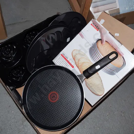box; frying pan, muffin moulds, cake cutter etc