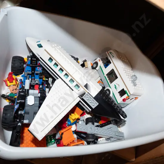 tub of Lego models and pieces
