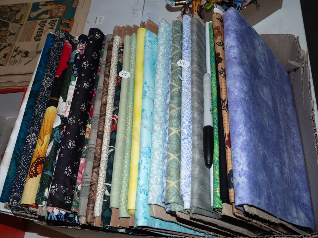 box of fabric pieces Image 1++
