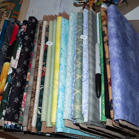 box of fabric pieces