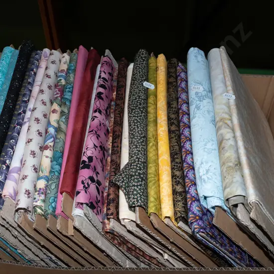 box of fabric pieces
