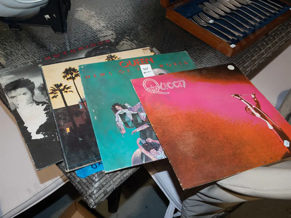 stack of LPs; Queen, The Eagels, Duran Duran - poor condition Image 1++