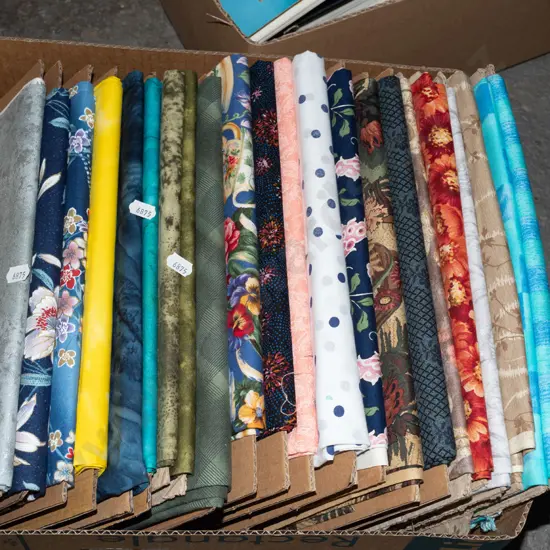 box of fabric pieces