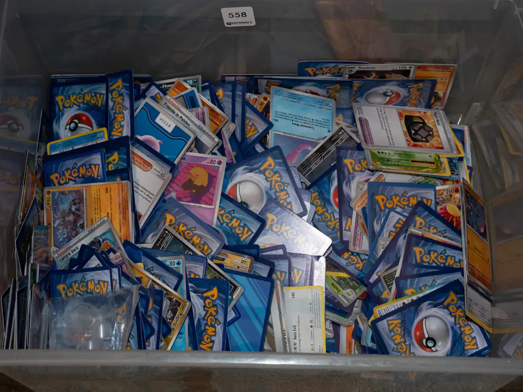 tub of Pokemon collector cards Image 1++