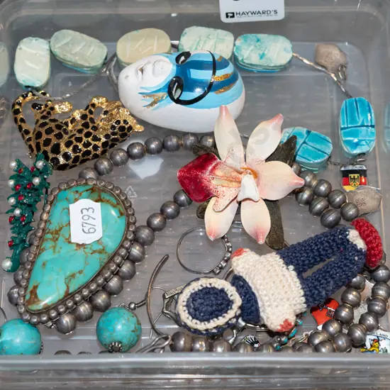 container of costume jewellery