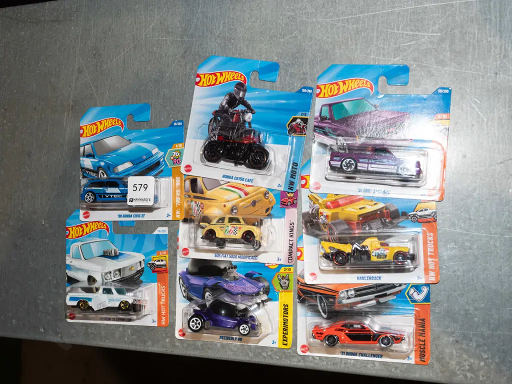 8x as new carded Hotwheels vehicles Image 1++