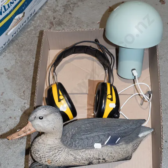 radio headphones, mushroom table lamp, plastic duck decoy