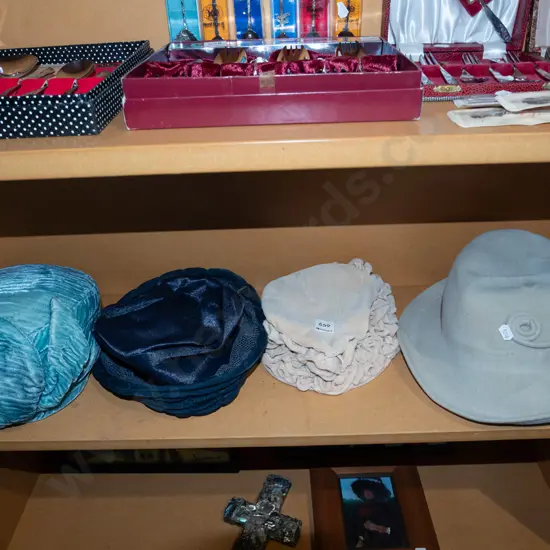 shelf of hats