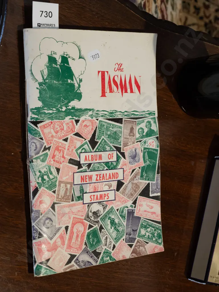 Tasman stamp album Image 1++