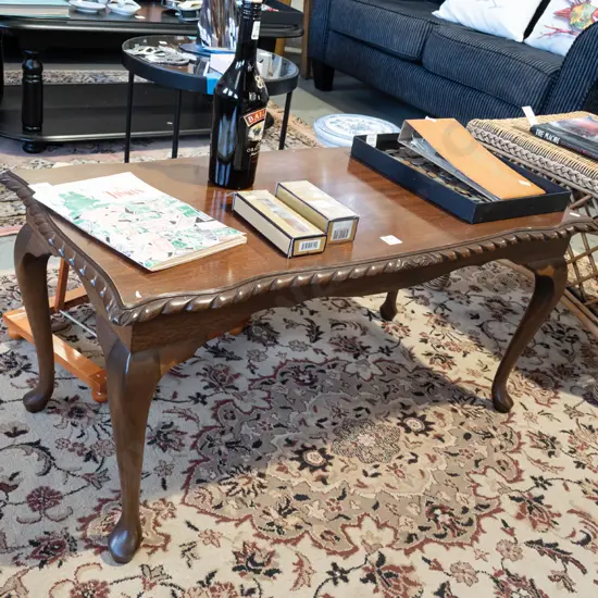 mahogany cab leg pie crust edge coffee table